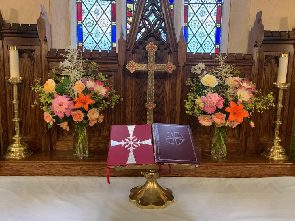 St. Luke's altar flowers pictured from June 30 and July 7 services are a combination of many different coloured roses, lilies, peonies, white astilbie and lady's mantle.